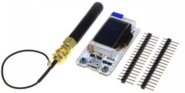 Figura 1 - Módulo WiFi LoRa 32(V2), juntamente com sua antena para o Rádio LoRa e pin-headers
